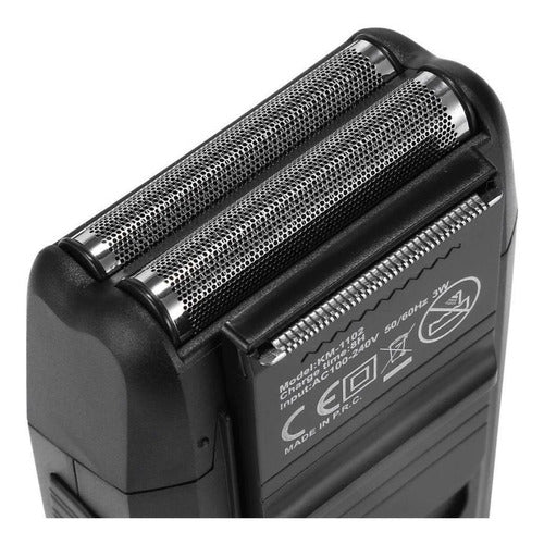 Barbeador Kemei KM-1102 preto 110V/240V